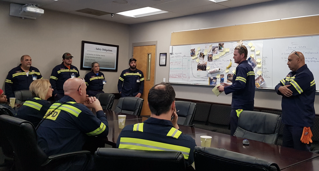 Autonomous Maintenance team reviewing workshop results
